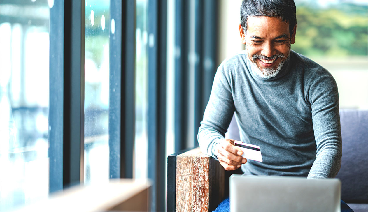 Man using Debit Card Online